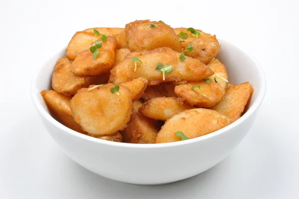 Some fried potato wedges — Zdjęcie stockowe