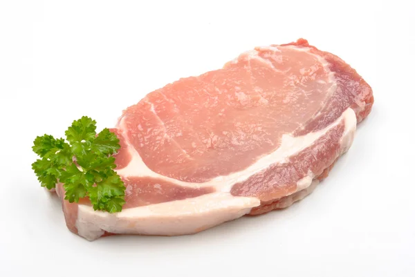 Bir ham organik domuz pirzolası — Stok fotoğraf