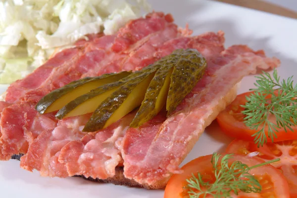 Grilled organic bacon on toast — Stock Photo, Image