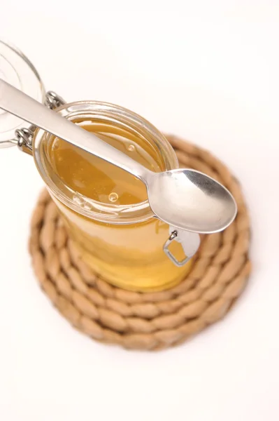 Glass filled with sweet honey — Stock Photo, Image