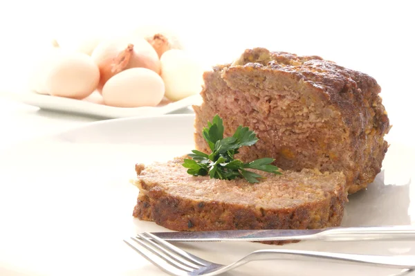 Meatloaf on a white plate — Stock Photo, Image