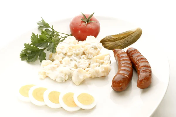 Potato salad and sausage — Stock Photo, Image