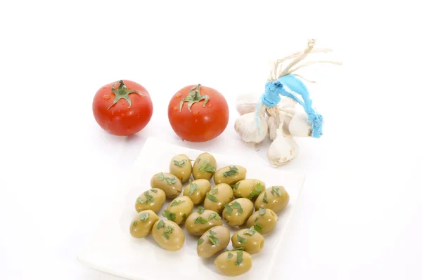 Zelené olivy s olejem — Stock fotografie
