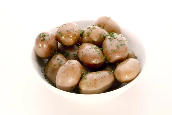Vissa potatis i en vit skål — Stockfoto