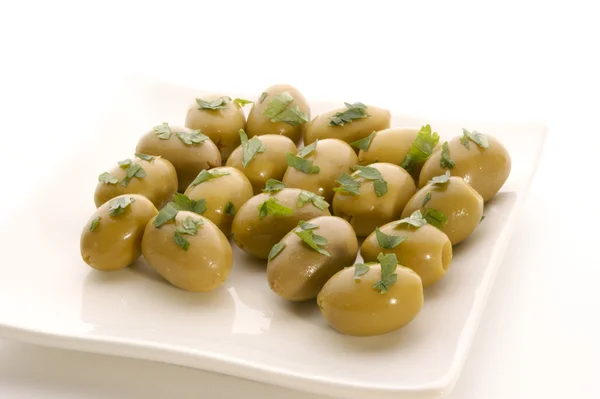 Green olive with oil and parsley — Stock Photo, Image