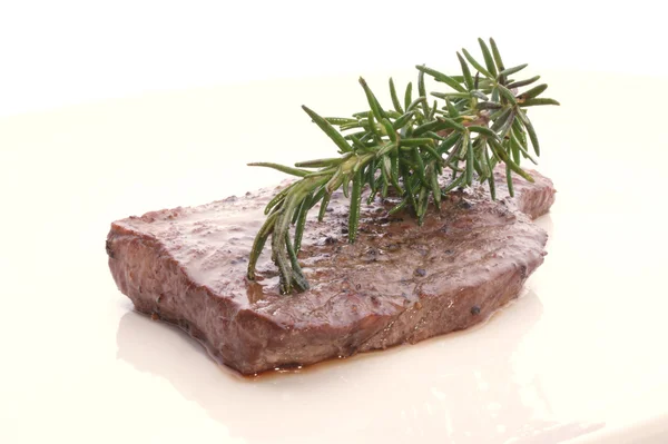 Grilled steak with rosemary — Stock Photo, Image