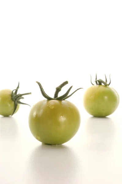 Green tomatoes are nice for salad — Stock Photo, Image