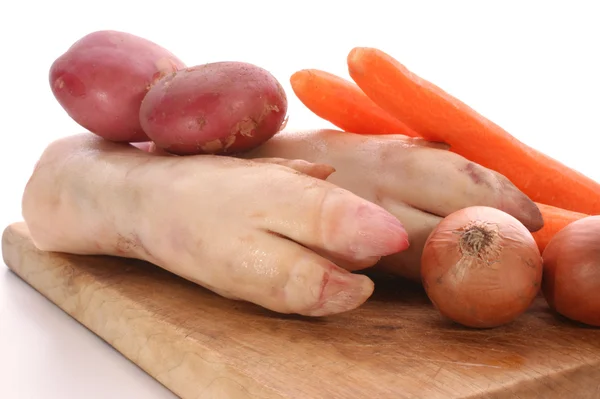 Pig trotter and some vegetables — Stock Photo, Image