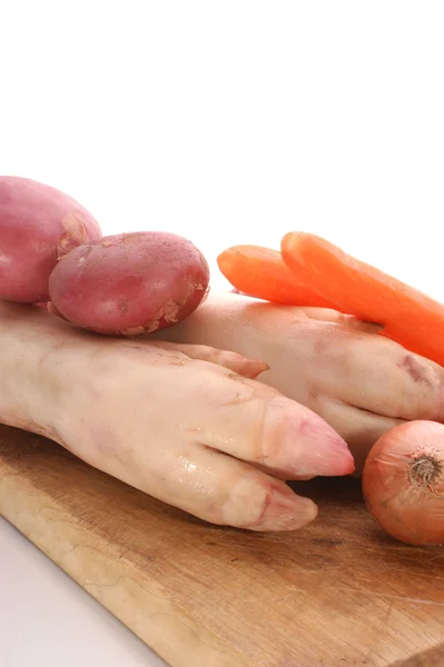 Pig trotter and some vegetables — Stock Photo, Image