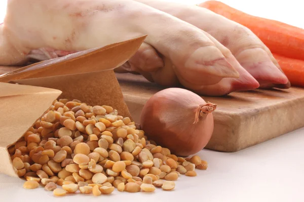 Pig trotter and yellow pea — Stock Photo, Image