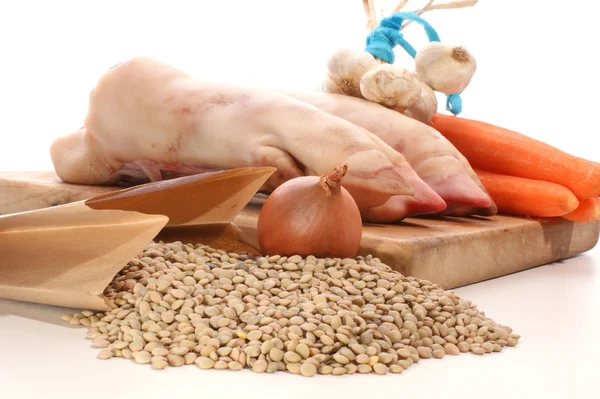 Pig trotter, lentils and vegetables — Stock Photo, Image