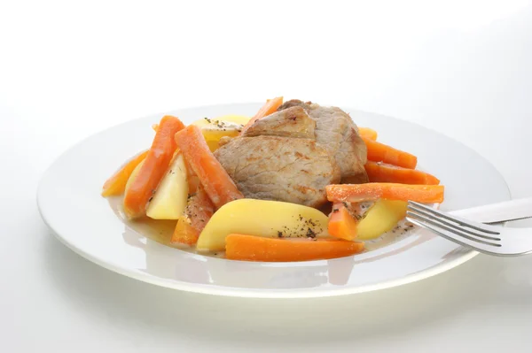 Pork chop with carrot — Stock Photo, Image
