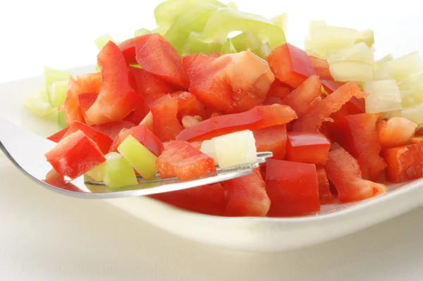 Paprika salad on white plate — Stock Photo, Image