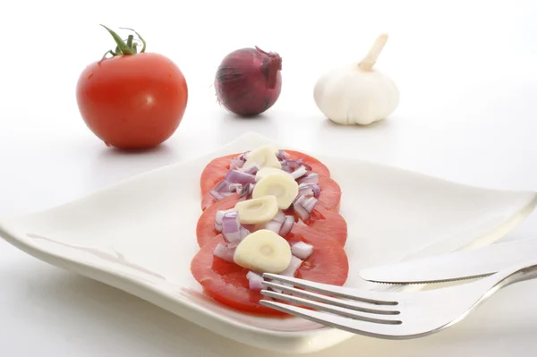 Salada de tomate com cebola — Fotografia de Stock