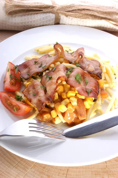 Pasta with bacon and sweet corn — Stok fotoğraf