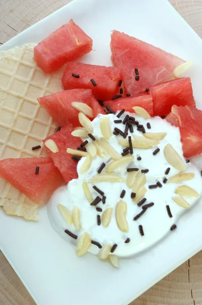 Melon, wafer and cream — Stock Photo, Image