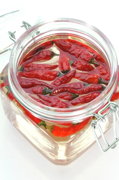 Organic red chili in a jar — Stock Photo, Image