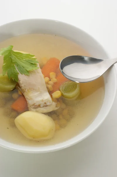 Carp fish soup with fresh organic herbs — Stock Photo, Image