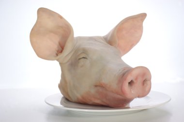 Pig's head on a plate clipart