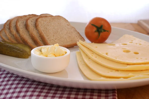 Cheese with organic tomato — Stock Photo, Image