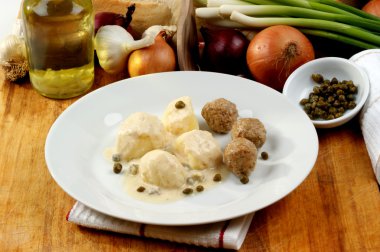 Meatballs in a white sauce clipart