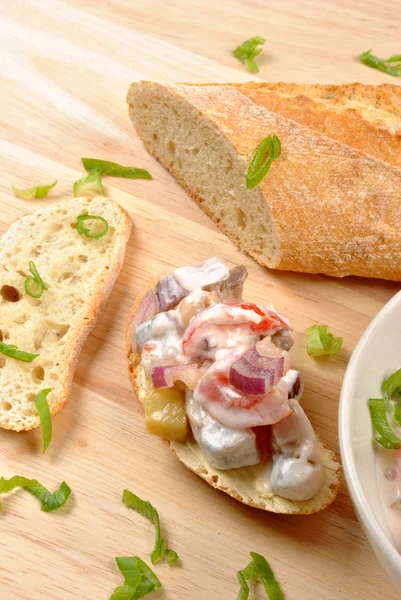 Herring salad and bread — Stock Photo, Image