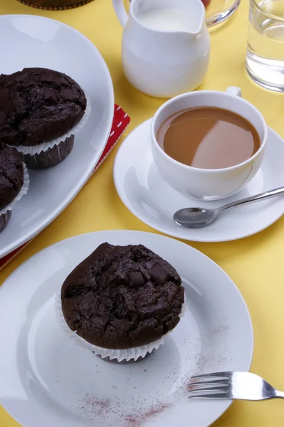 Sweet chocolate muffins on a plate — Stock Photo, Image