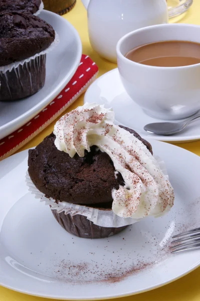 Sweet chocolate muffins on a plate — Stock Photo, Image