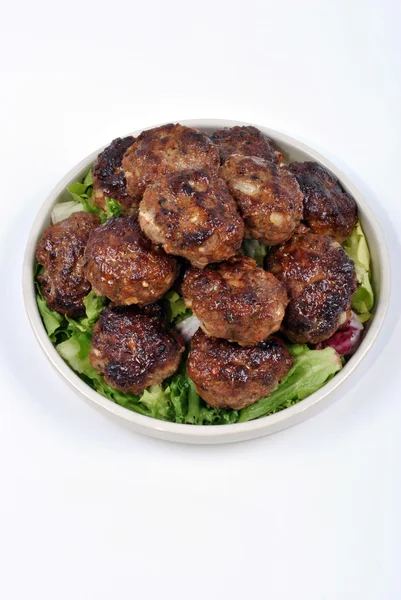 Rissole with organic salad on a plate — Stock Photo, Image