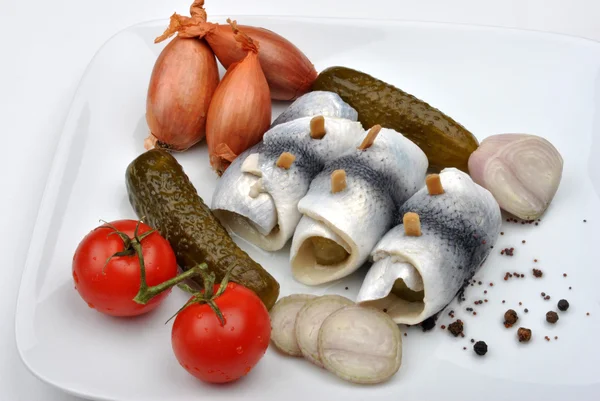 Organic rollmops on a white plate — Stock Photo, Image