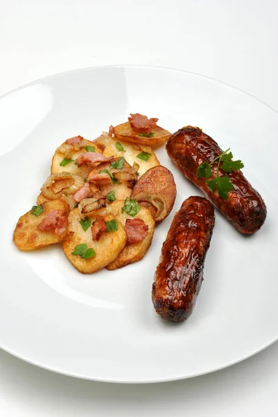 Roasted potato with sausage — Stock Photo, Image