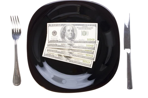 Concept. Dollars on the black plate — Stock Photo, Image