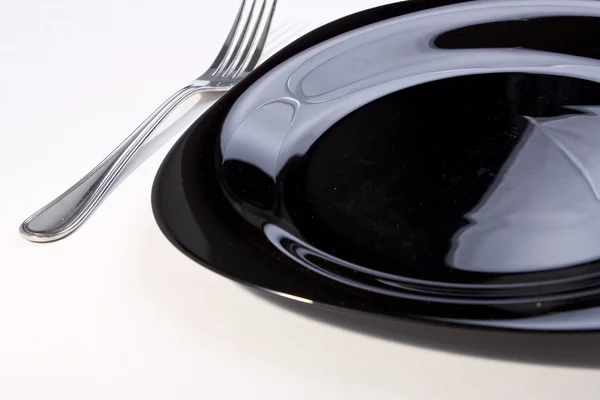 Prázdný talíř s vidličkou — Stock fotografie