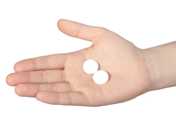 Ręka z dwóch dużych tabletki — Zdjęcie stockowe