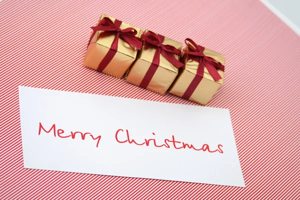Karácsonyi doboz egy gratuláló kártya — Stock Fotó