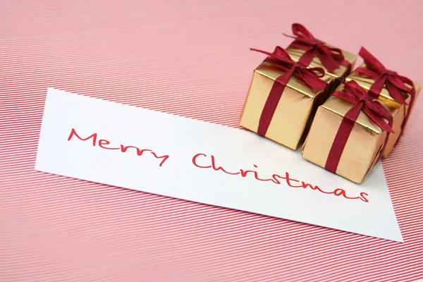 Christmas boxes a congratulatory card — Stock Photo, Image