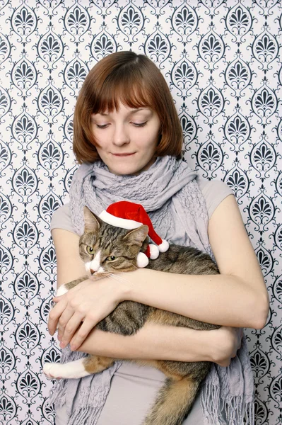 Ragazza con un gatto di Natale — Foto Stock