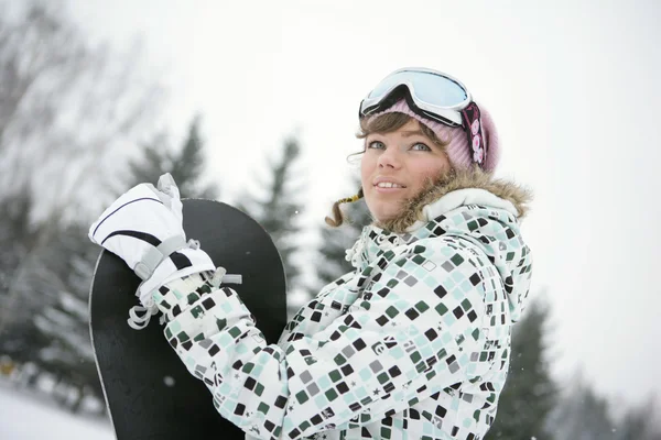 Krásná dívka snowborder — Stock fotografie