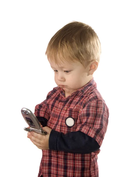 Boy is browsing the snapshots on mobile — Stock Photo, Image