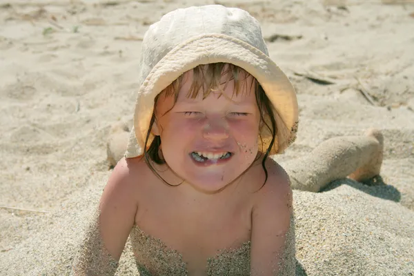 stock image Baby girl plays with a sand