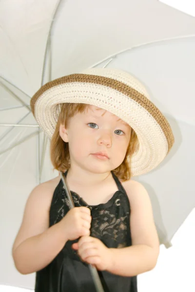 Маленька дівчинка з парасолькою — стокове фото