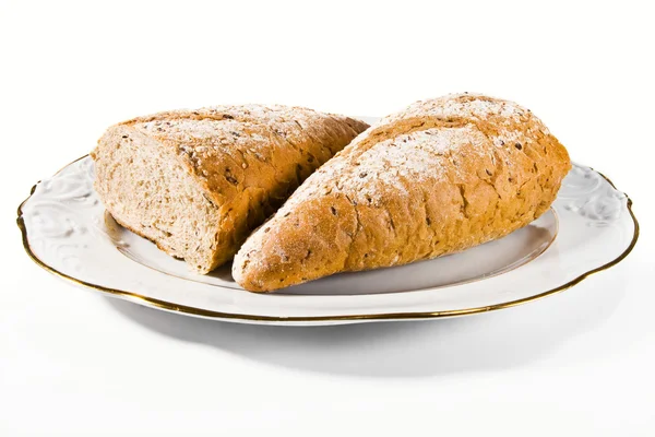 A loaf of bread cut in half — Stock Photo, Image