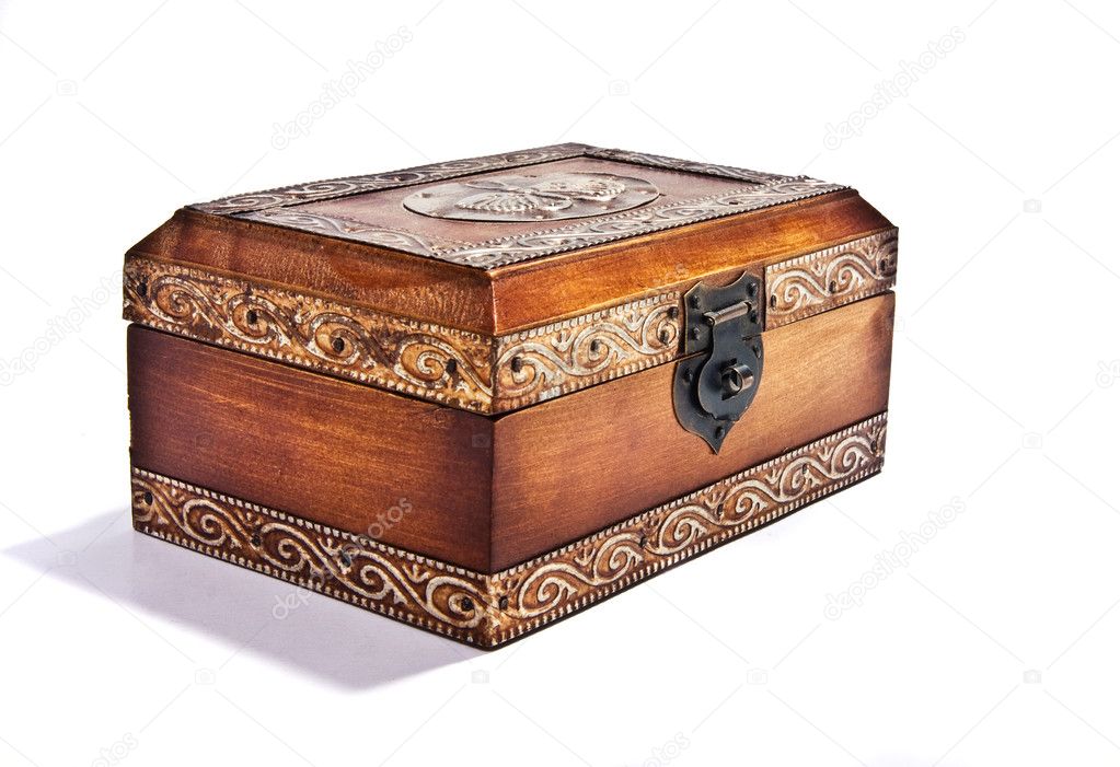 An antique engraved wooden jewelry box