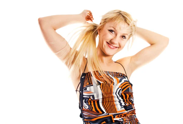 A happy young blonde dancing — Stock Photo, Image