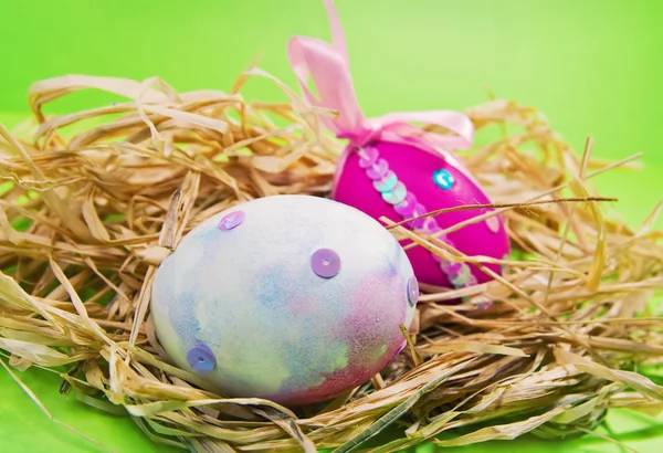 Easter eggs on green background — Stock Photo, Image
