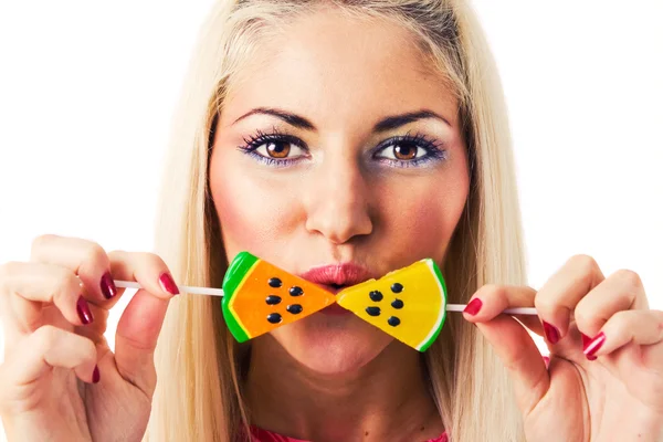 Beautiful blonde with lollipops — Stock Photo, Image
