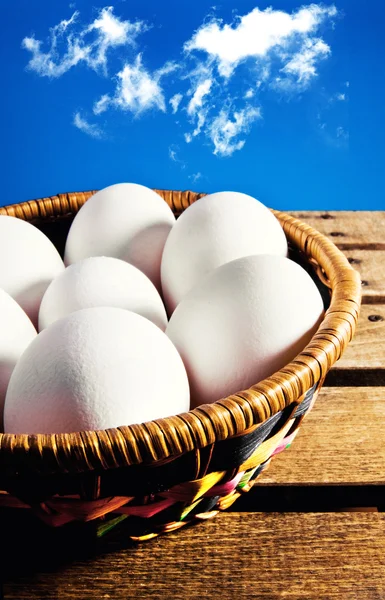 White eggs in a basket — Stock Photo, Image