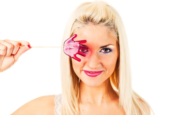 Beautiful blonde with a lollipop — Stock Photo, Image