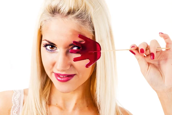Beautiful blonde with a lollipop — Stock Photo, Image
