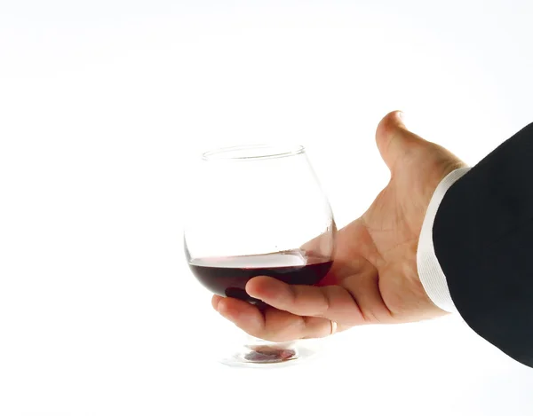 Ruce se sklenicí vína — Stock fotografie